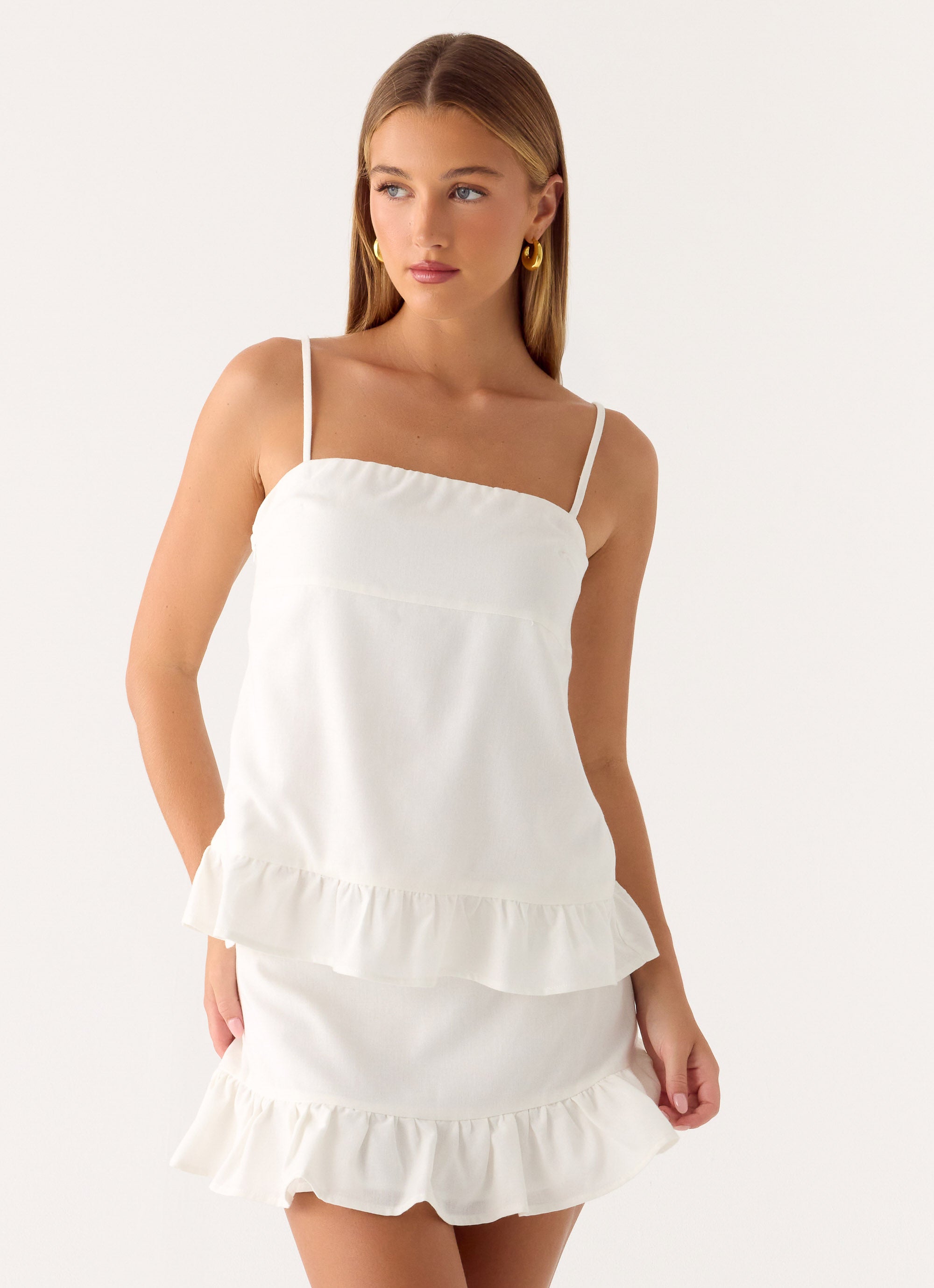 Lucie Mae | White Mini Skirt with Ruffle Hem | Stylish Summer Look for Women